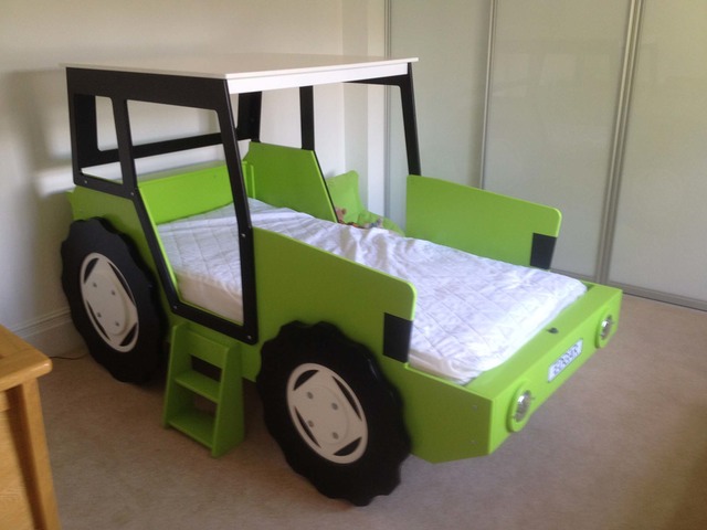 lime green tractor bed with white wheels